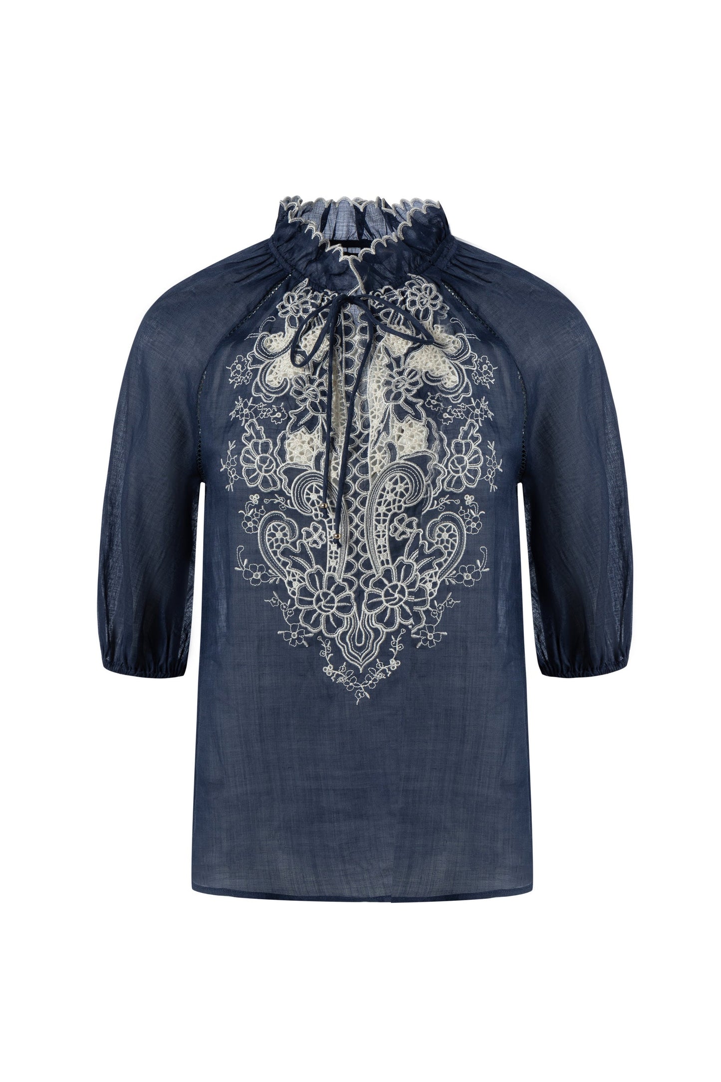 "Navy embroidered blouse with white floral lace detail on a white background."