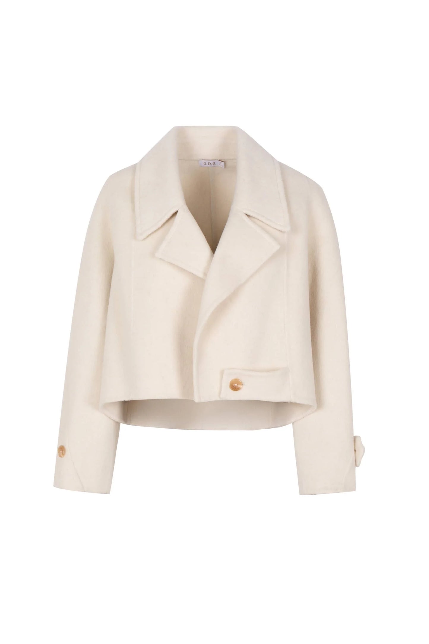 Close-up front shot of Luciano short wool coat and clean tailoring