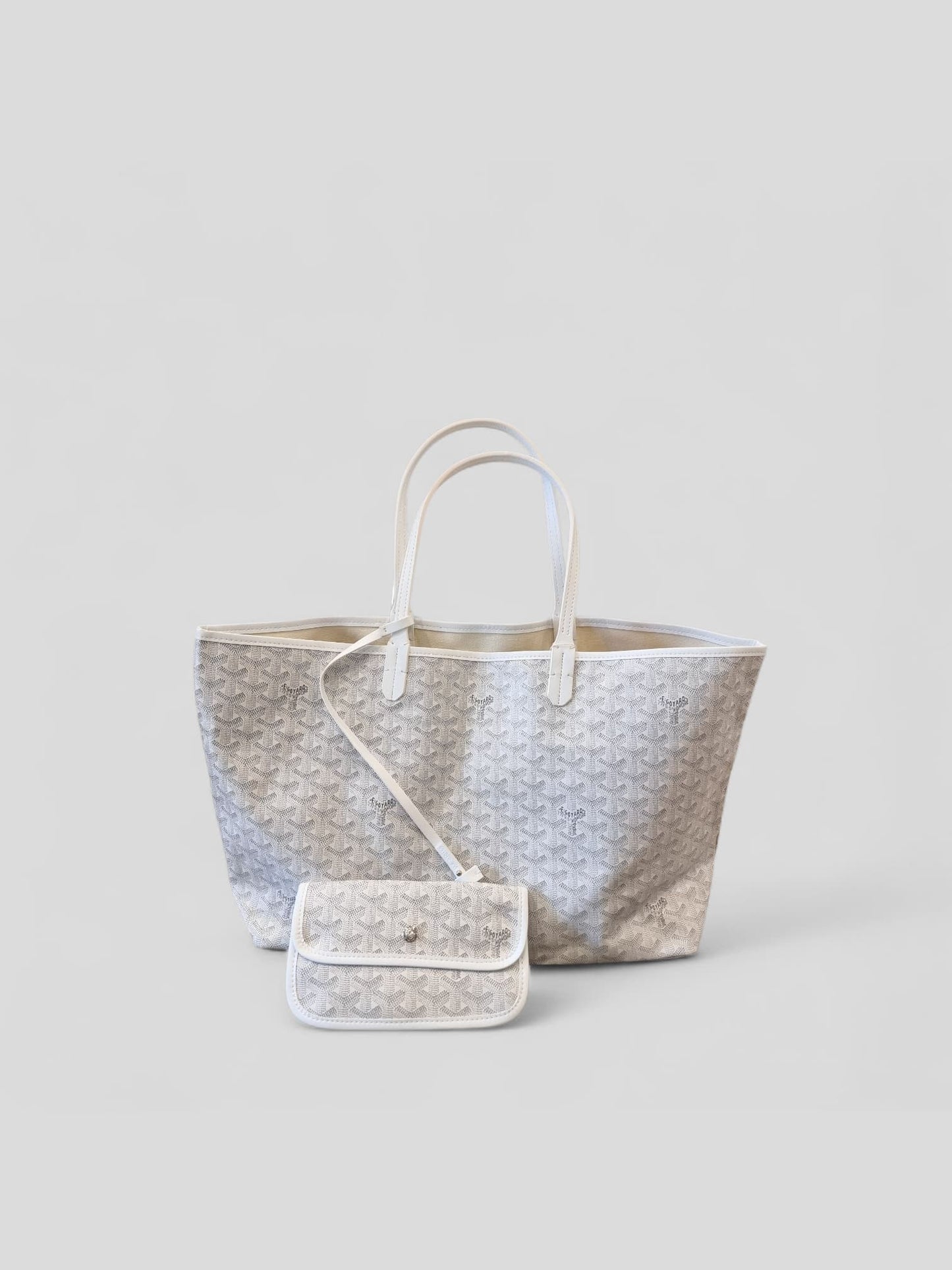 Front view of large patterned tote bag with white handles