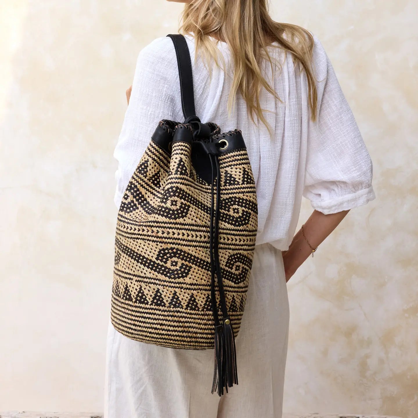 Borneo handwoven sling bag showing batik-print interior lining.