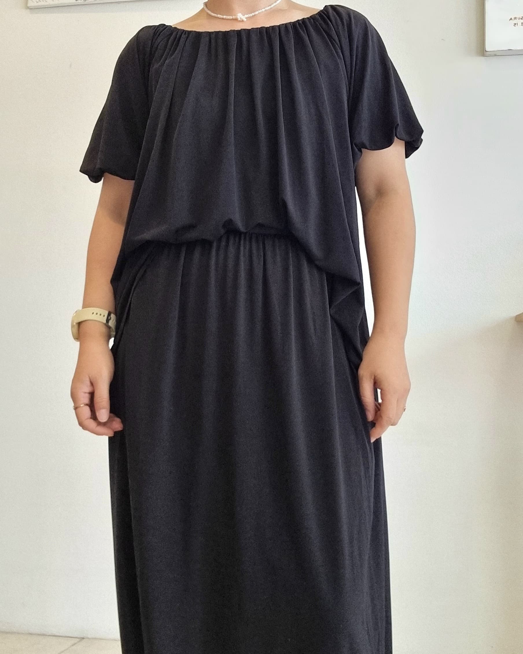 Flowy hem and silhouette of the Seren Black Two-Piece Set