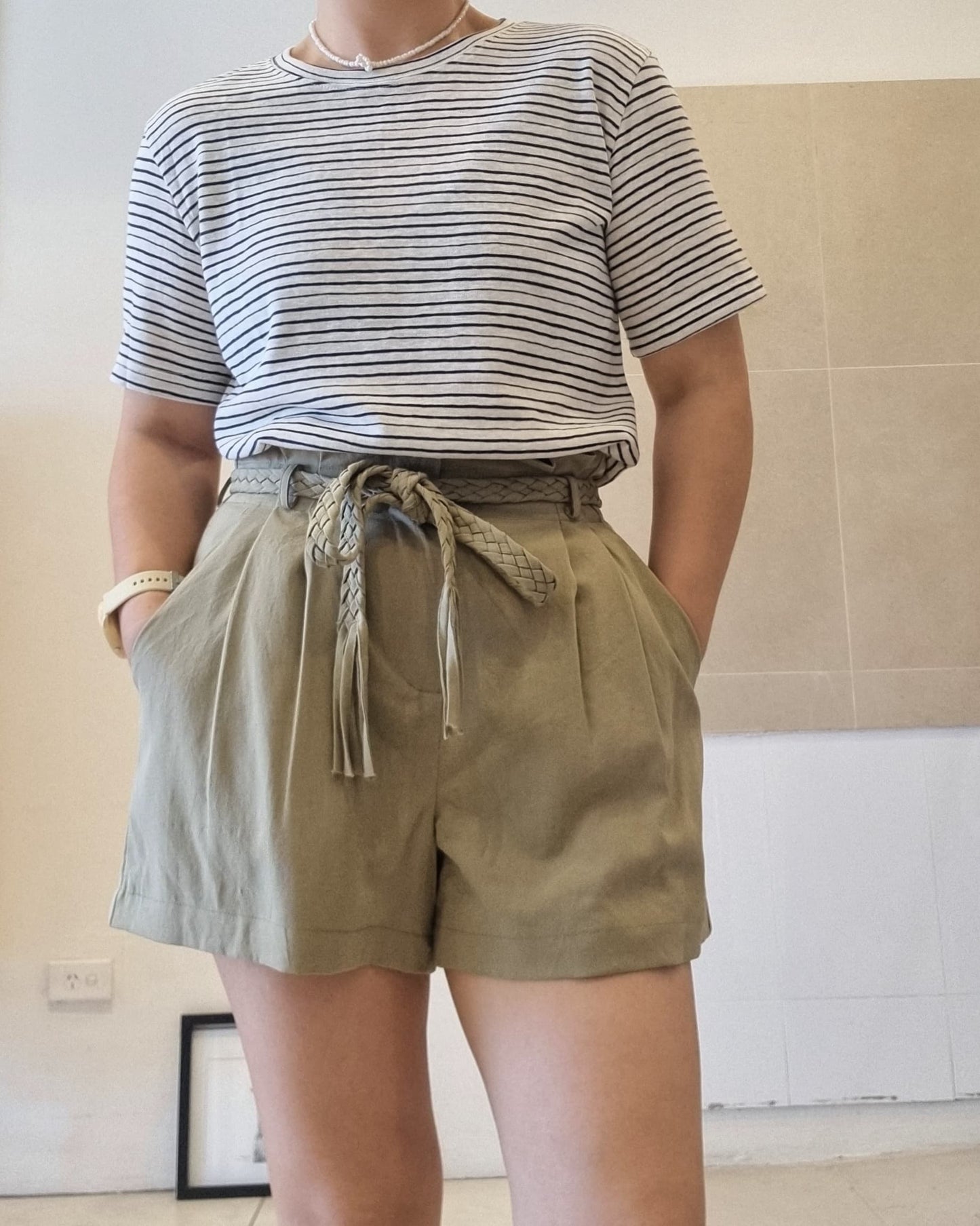 Black stripe cotton linen t-shirt styled with khaki drawstring shorts, relaxed summer fit