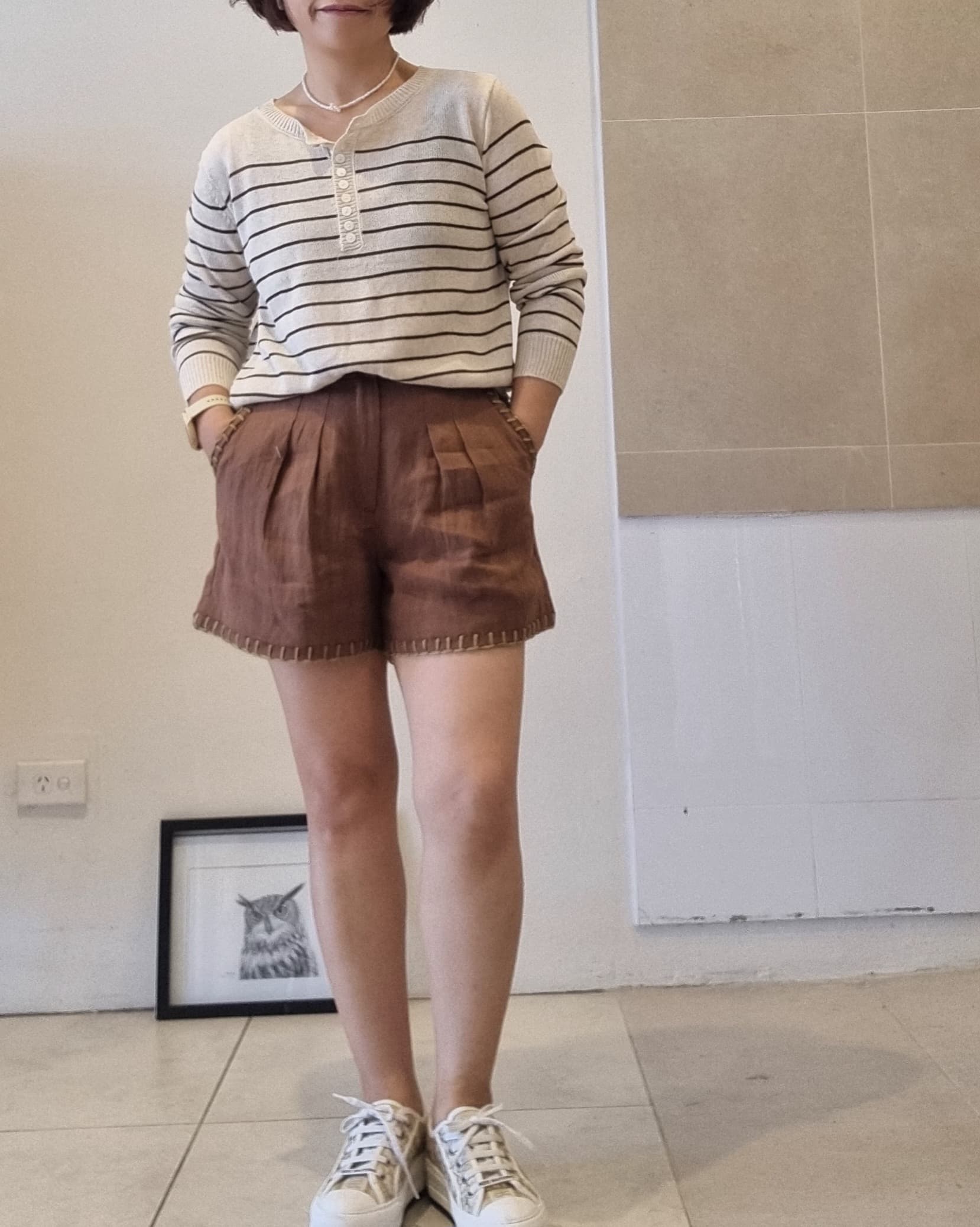 Women’s striped cotton linen top, relaxed fit, styled with brown shorts