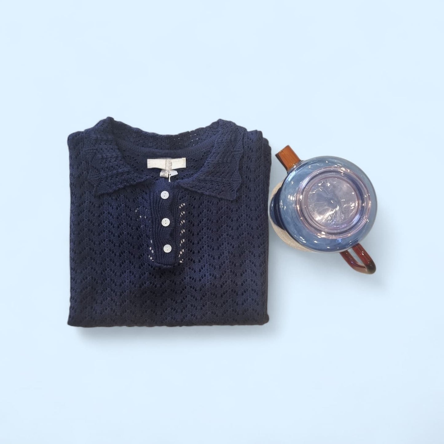 Navy short sleeve lace knit top with collar and button detail