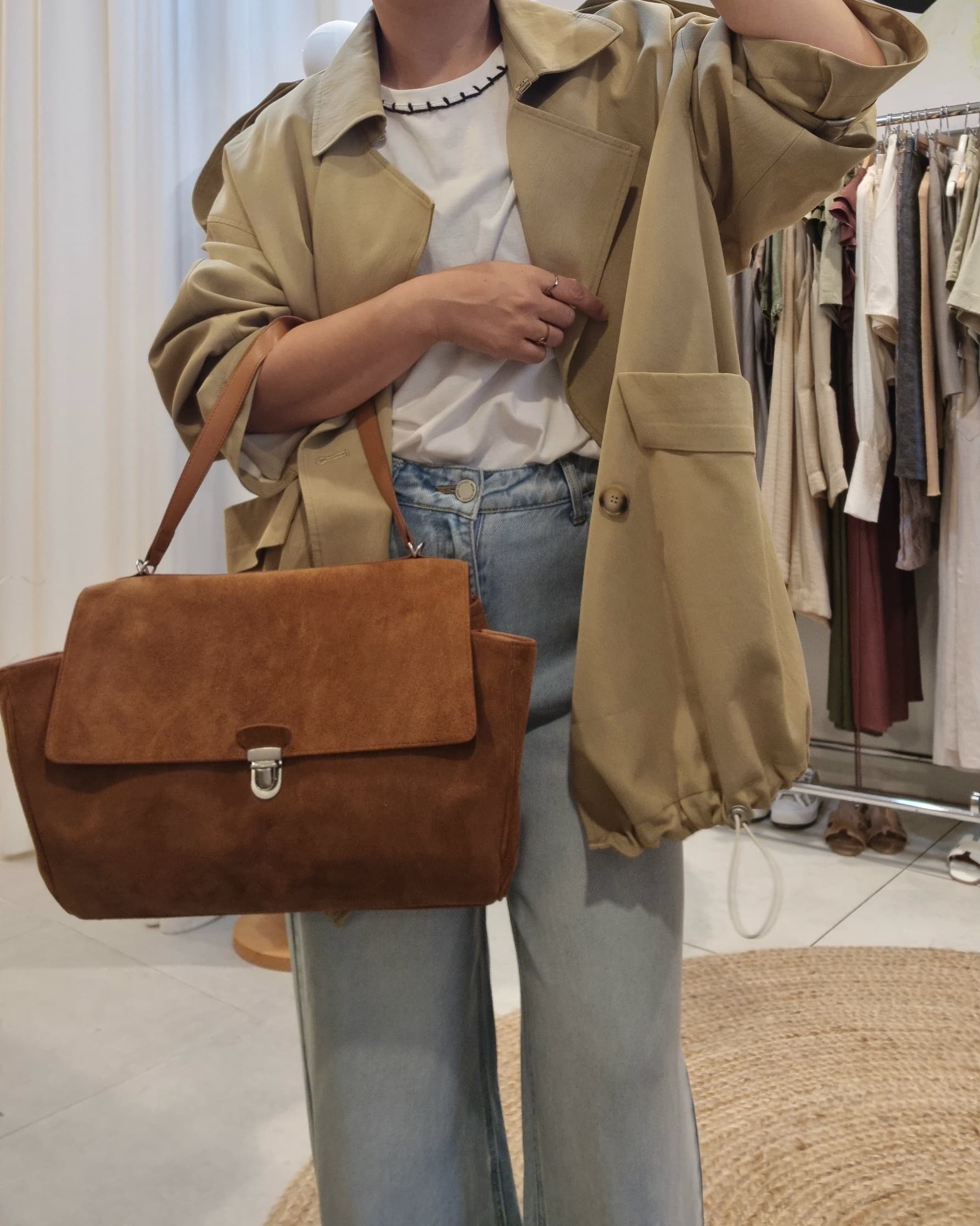 Model front view wearing Beige Luxe Trench Coat with jeans