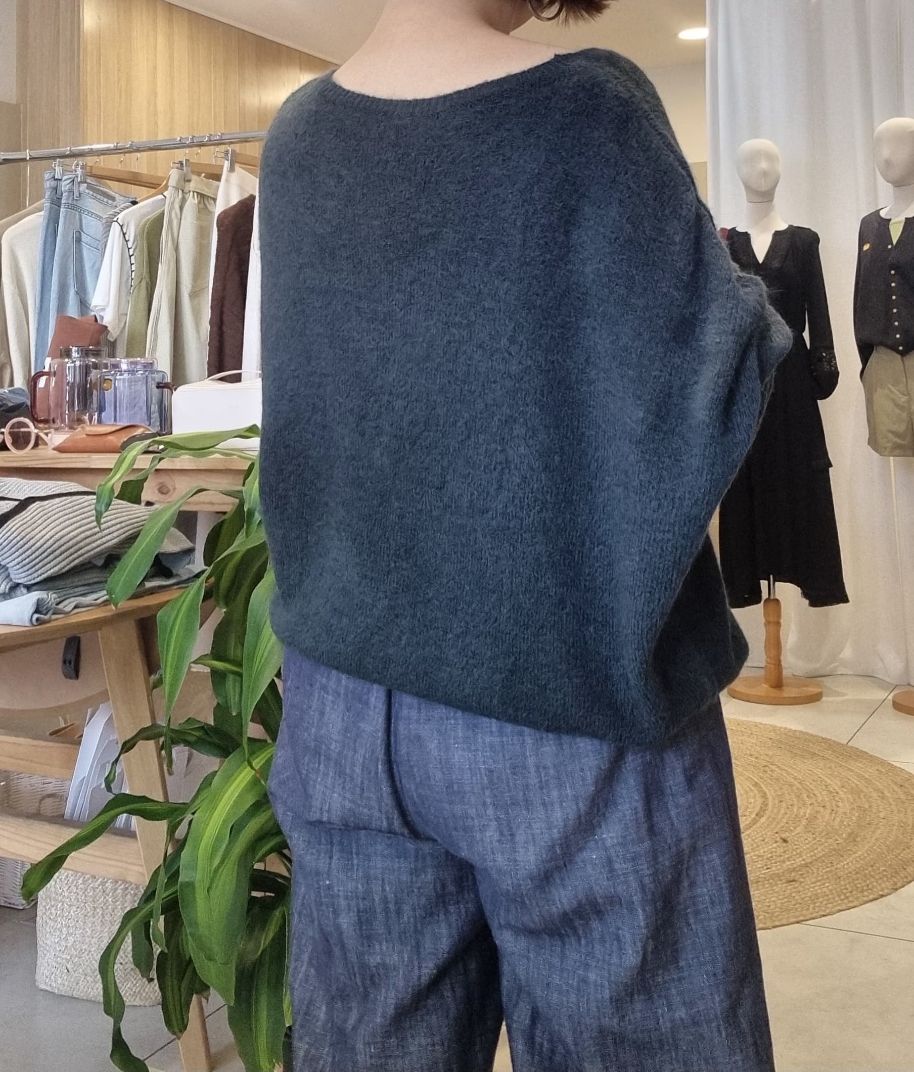 Model wearing Khaki Black wool blend knit sweater casual styling