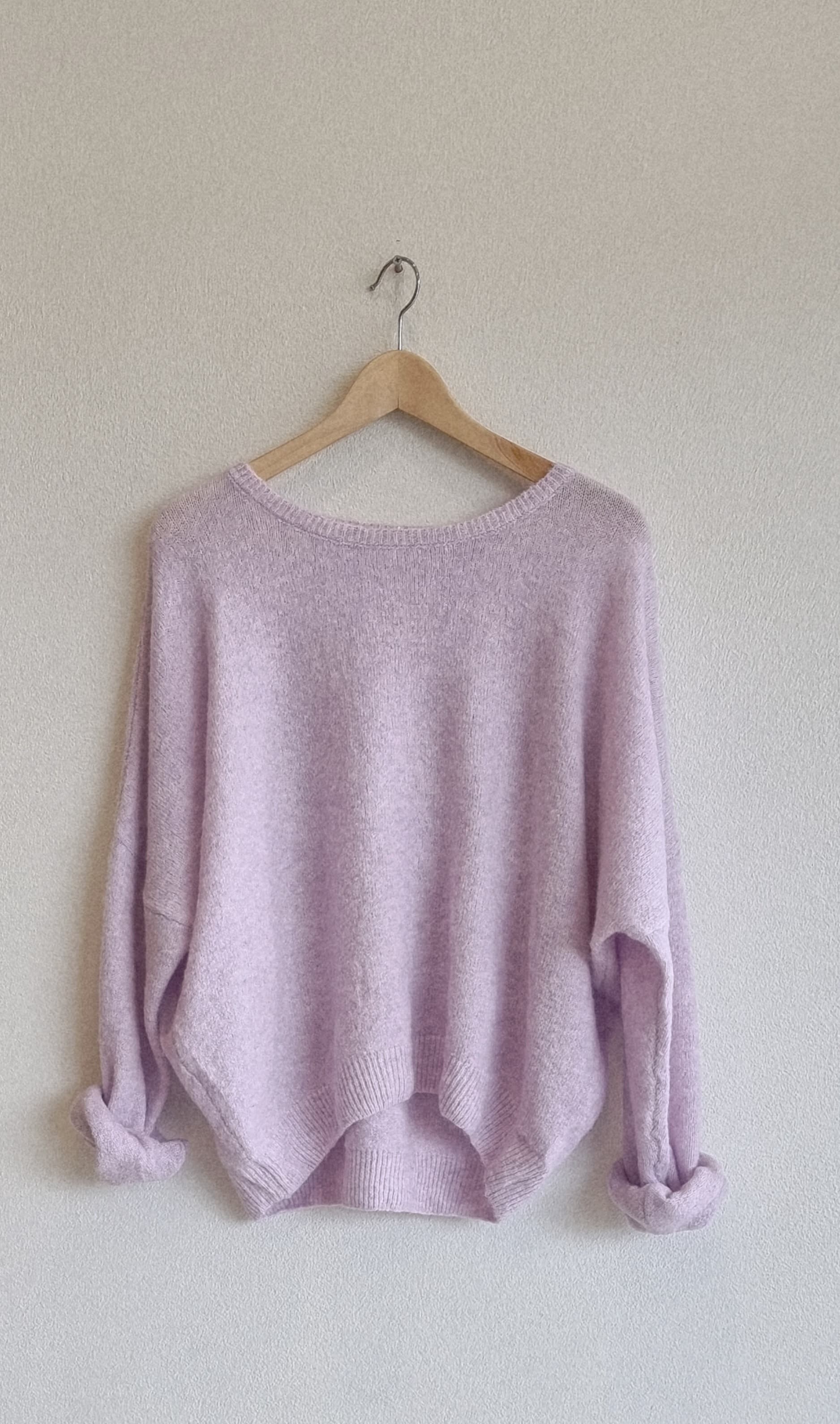 Pink wool blend loose fit knit sweater on hanger