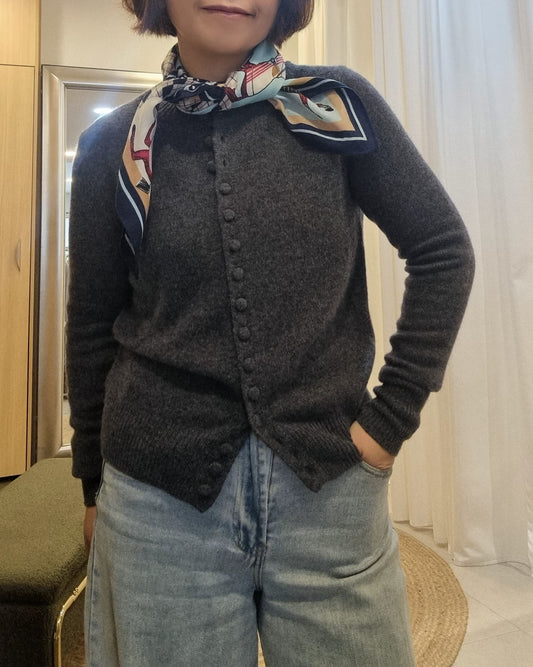 Model wearing grey wool cardigan with jeans front view