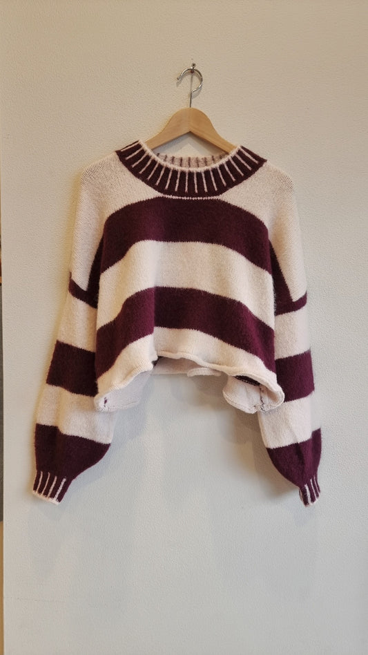 soft stripe knit sweater front view on hanger