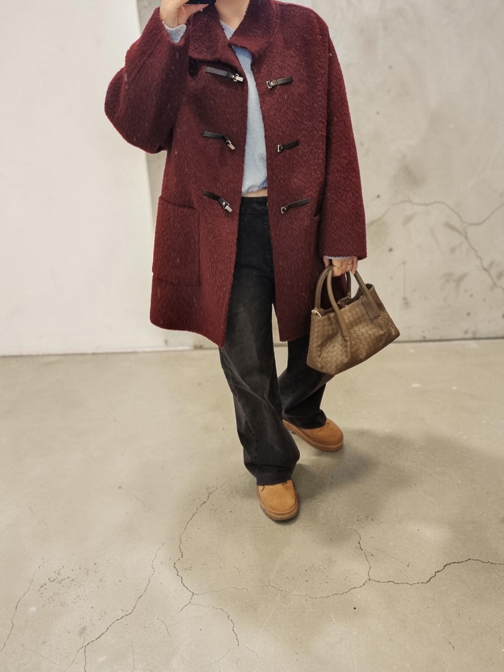 Elegant burgundy winter coat for women outfit styling