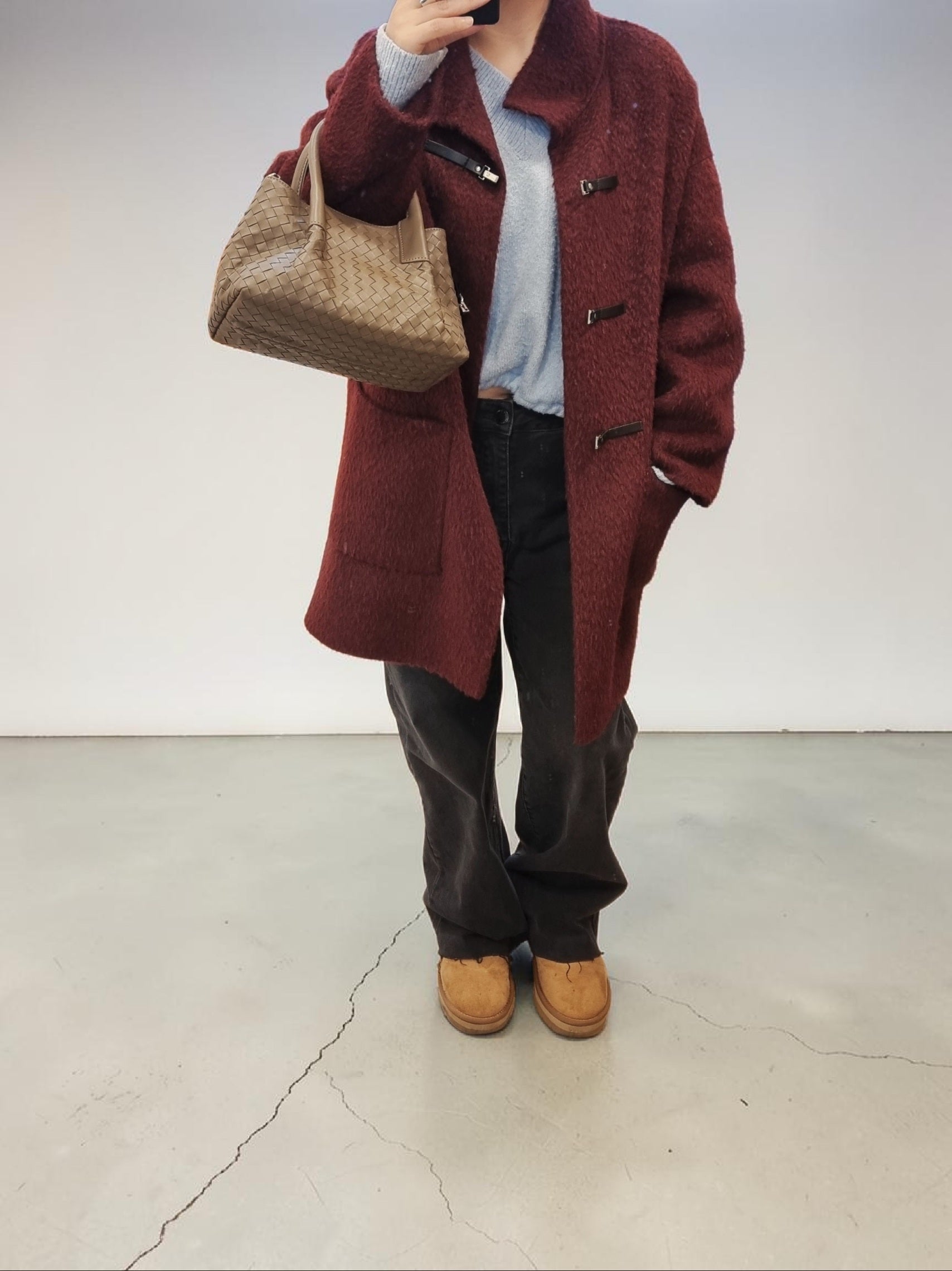Women's burgundy oversized coat full length look