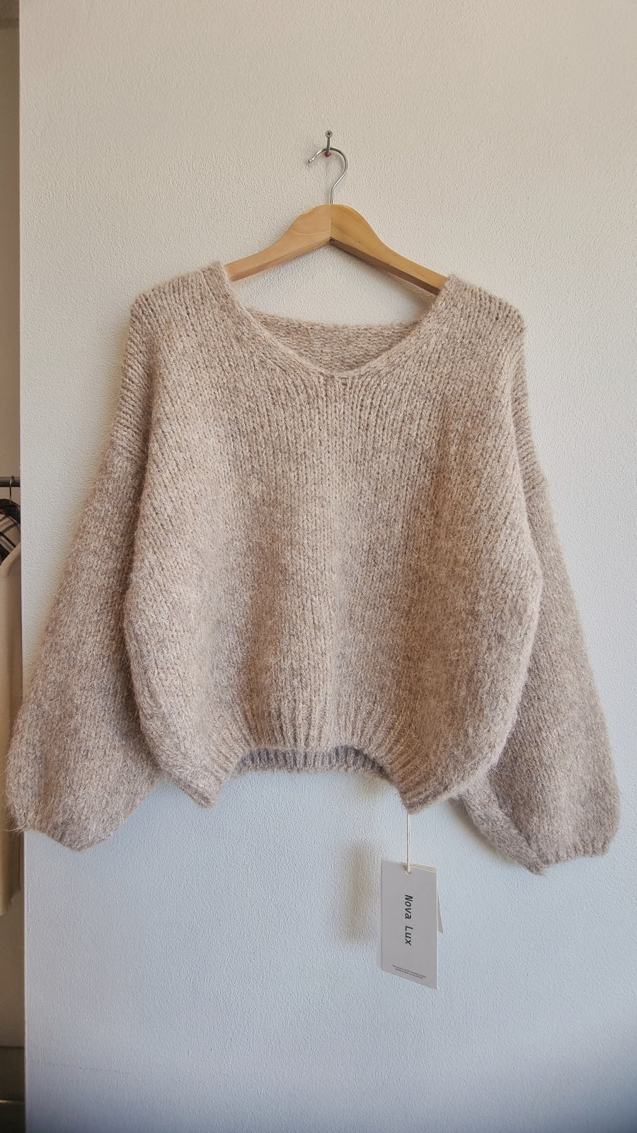 Soft textured beige wool blend knit fabric