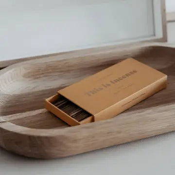 Noosa incense packaging styled with citrus – Nova Lux