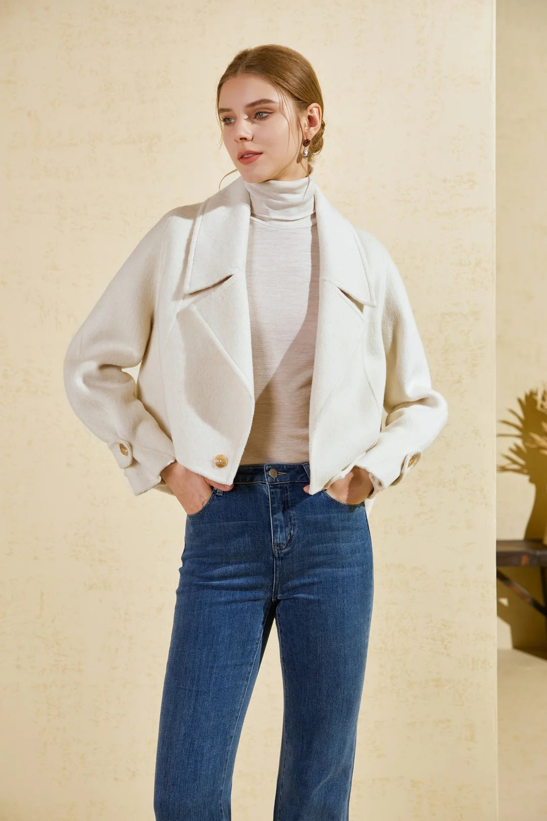 Front view of model wearing Luciano short wool coat in light beige