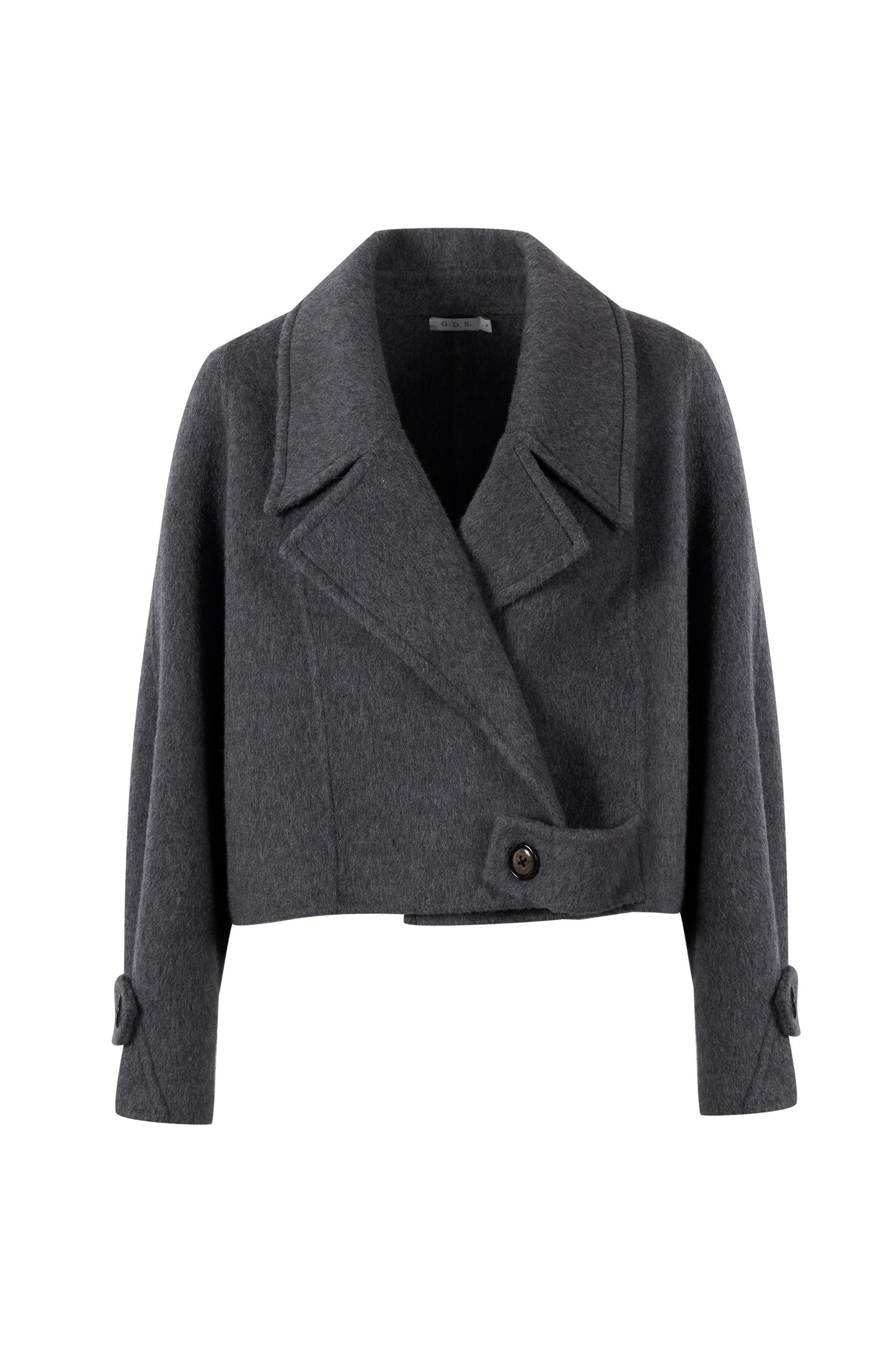 Close-up front shot of Luciano short wool coat and clean tailoring
