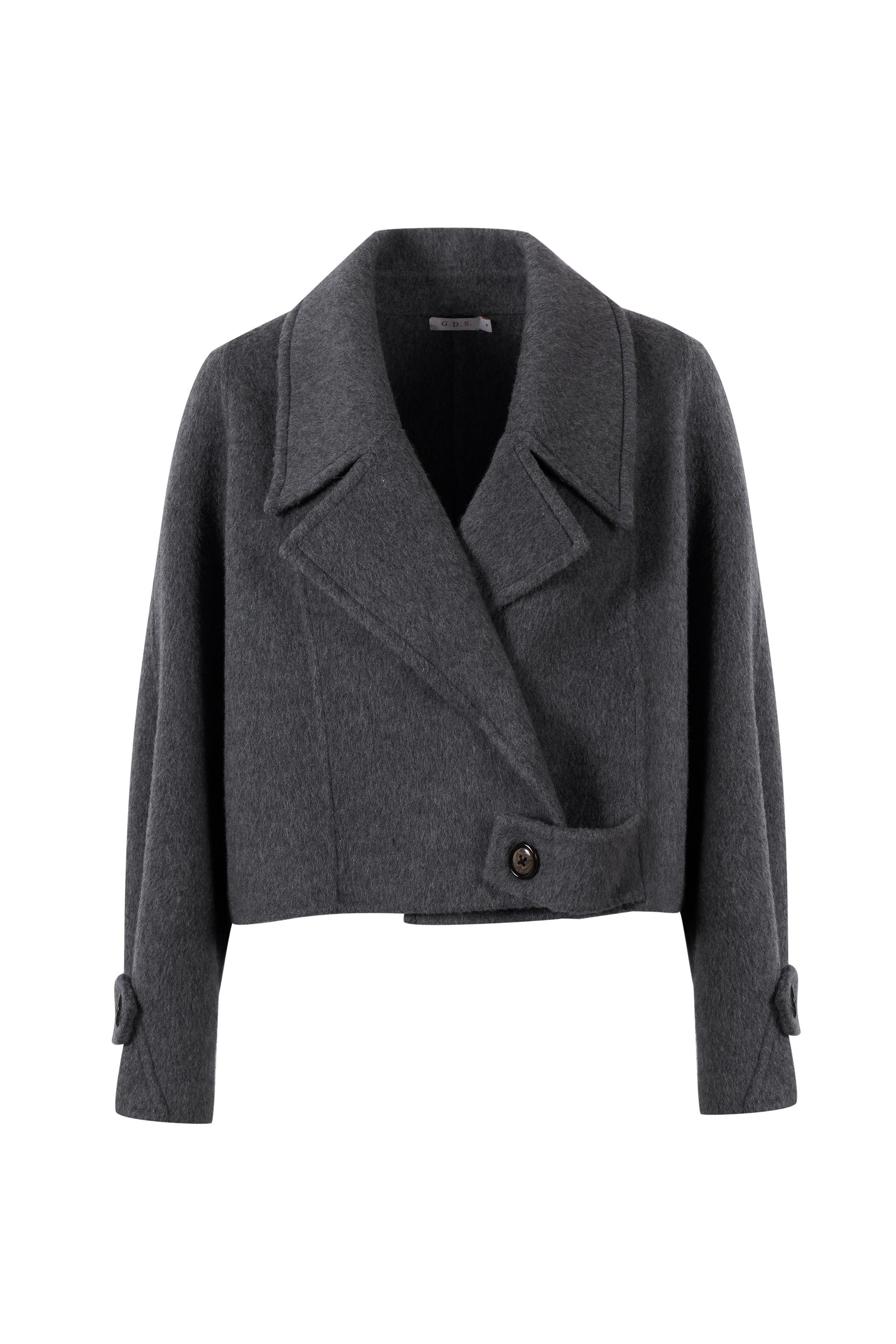 Close-up front shot of Luciano short wool coat and clean tailoring