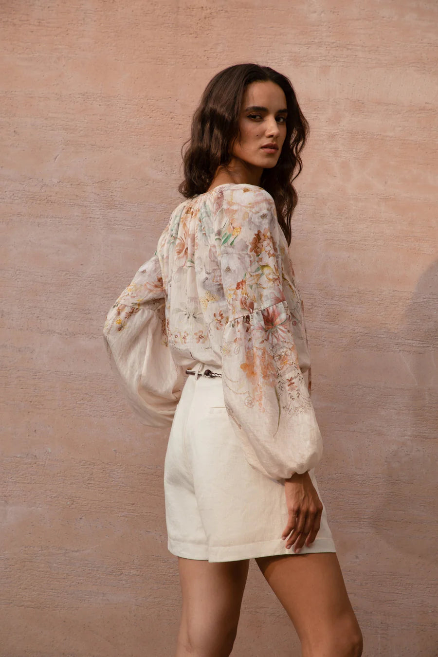 “Atticus floral blouse showing detailed print and neckline design.”