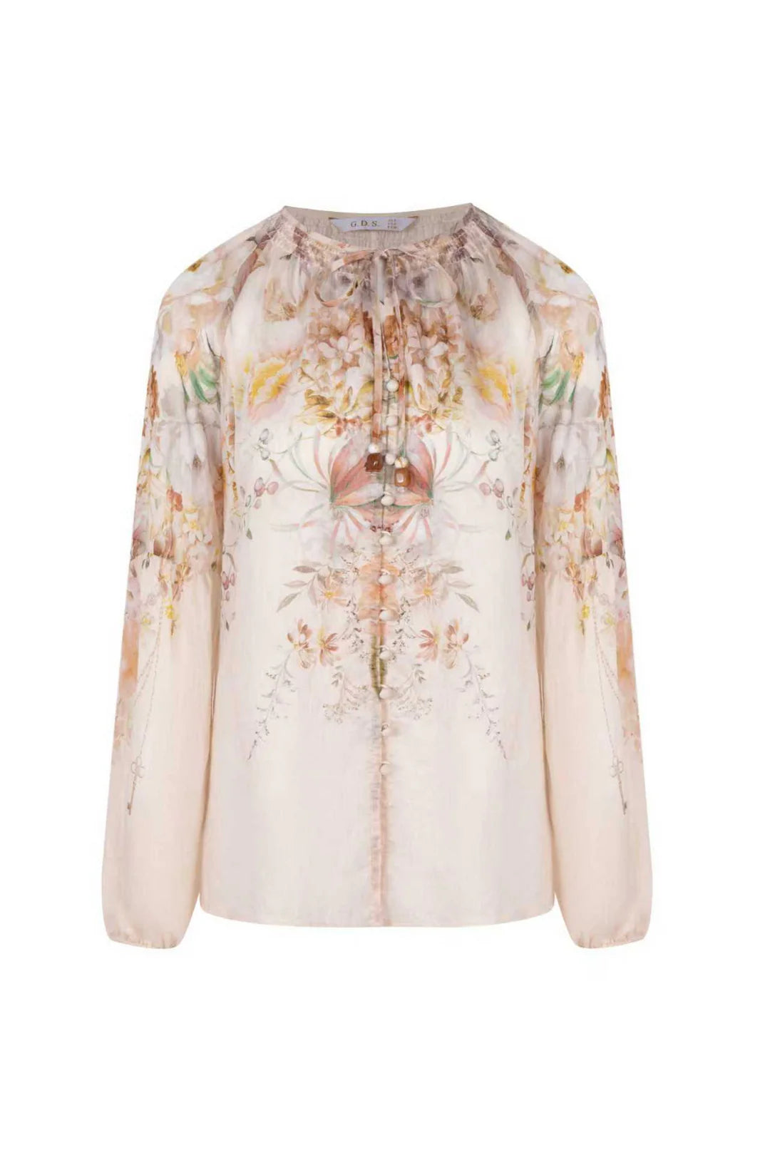 “Flat lay of the Atticus printed blouse with romantic watercolor floral print.”