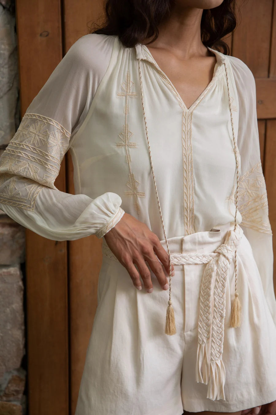 Close-up of fabric texture and lining detail near waistband