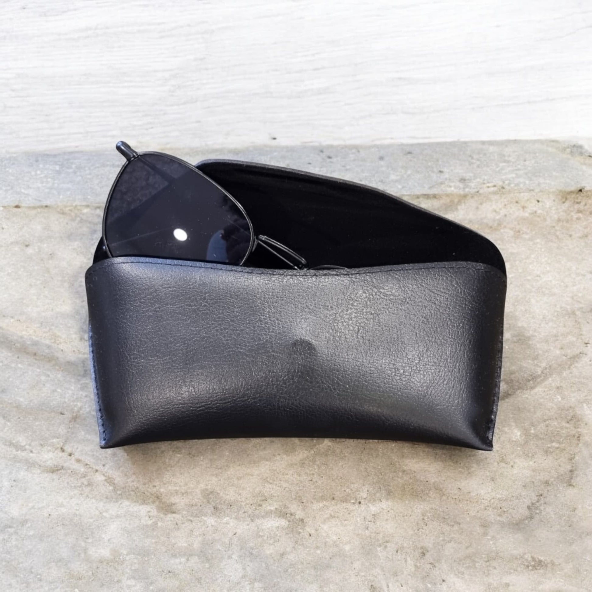 Black sunglasses case with sunglasses underneath – Nova Lux