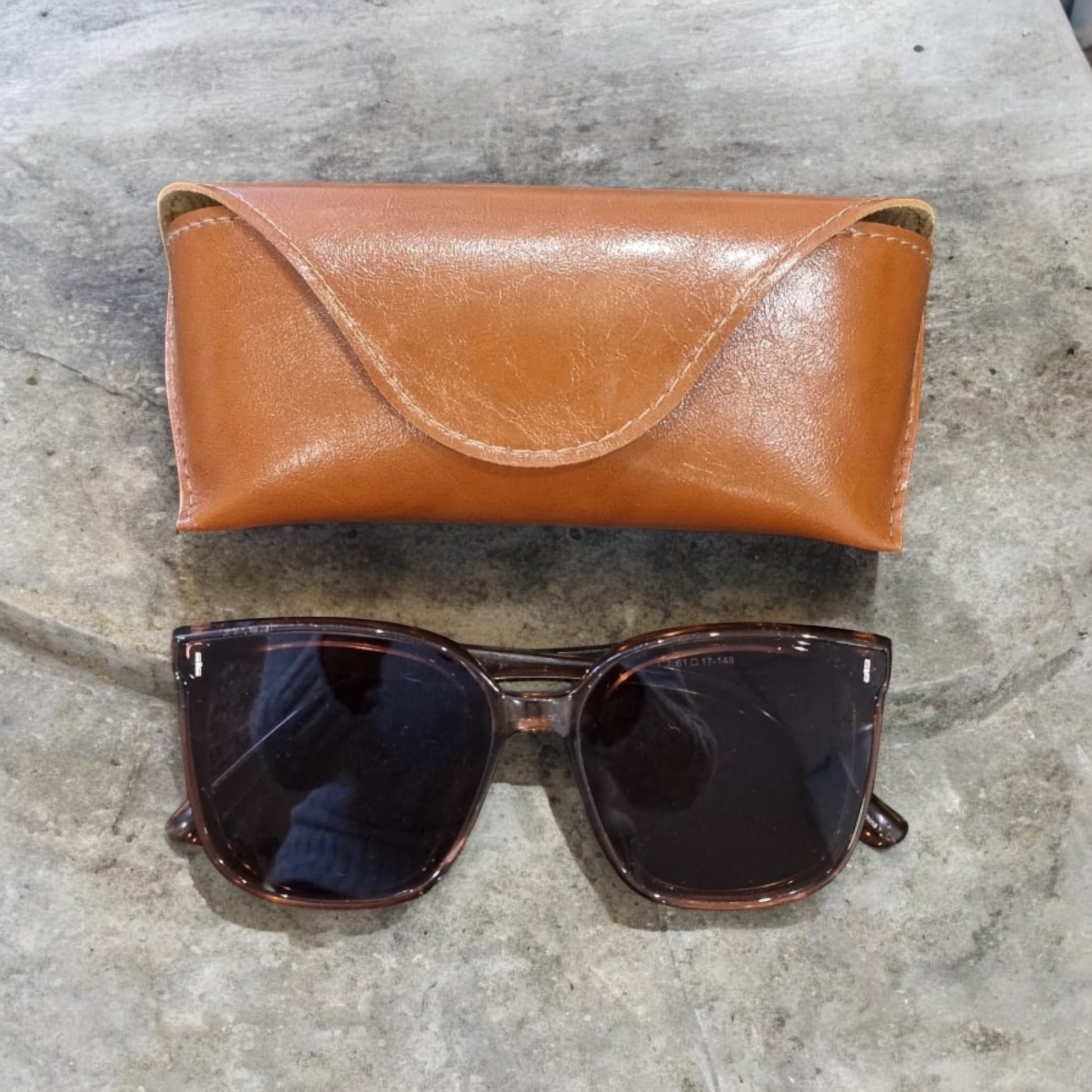 Brown sunglasses case with sunglasses underneath – Nova Lux