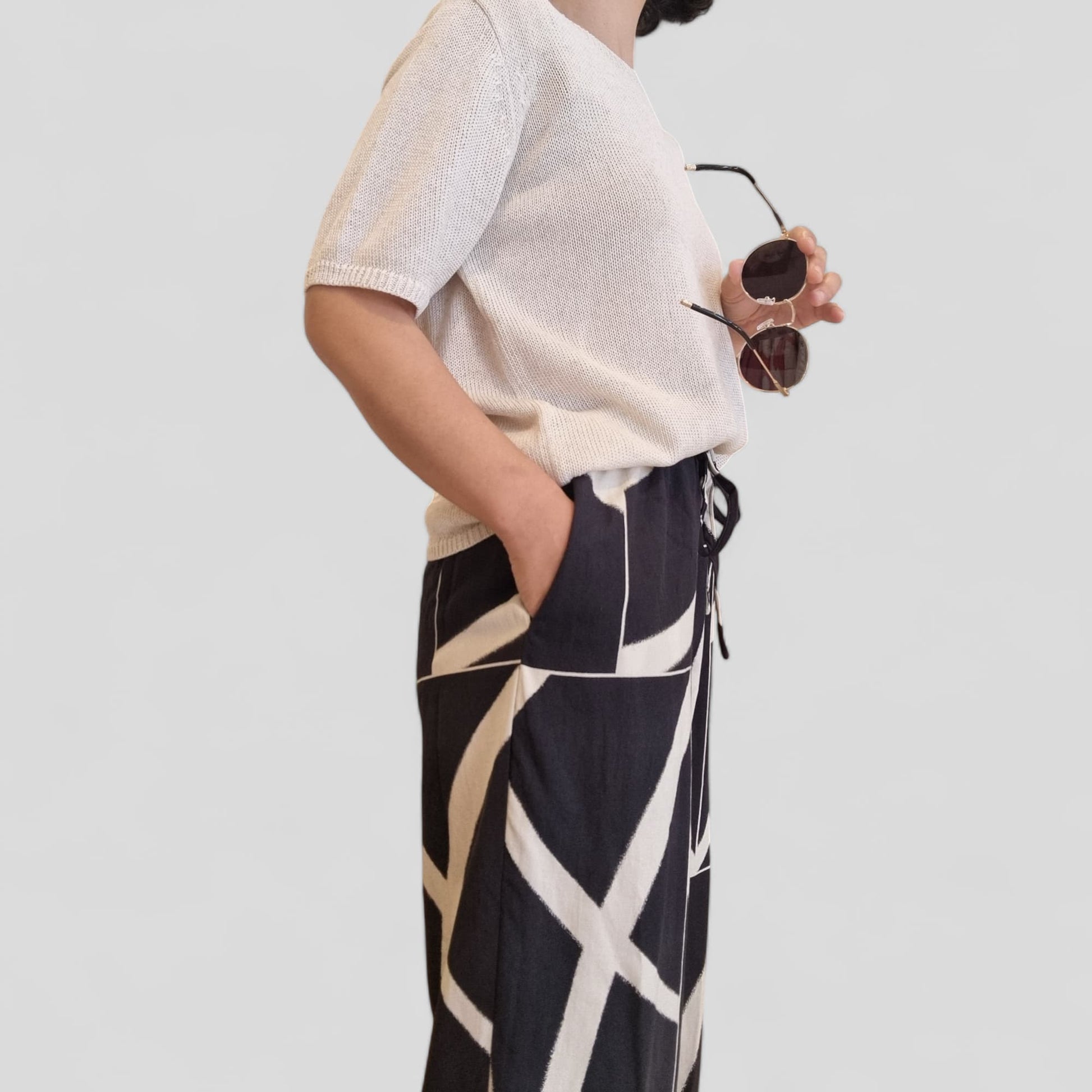 Model wearing summer knit top side view – Nova Lux
