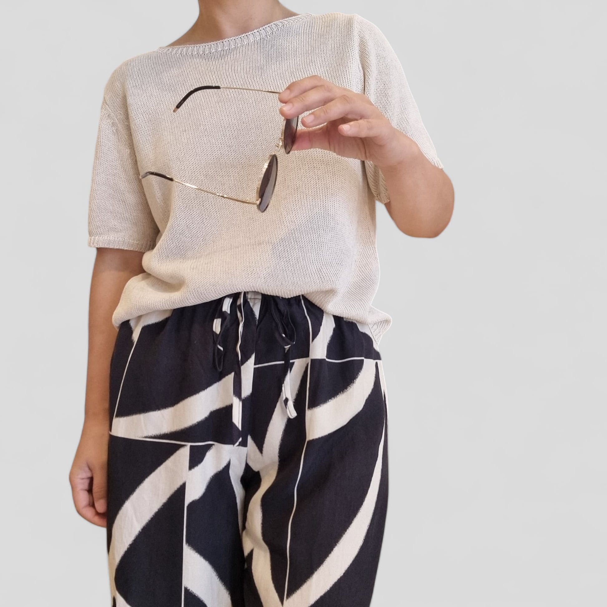 Model wearing beige summer knit top front view – Nova Lux

