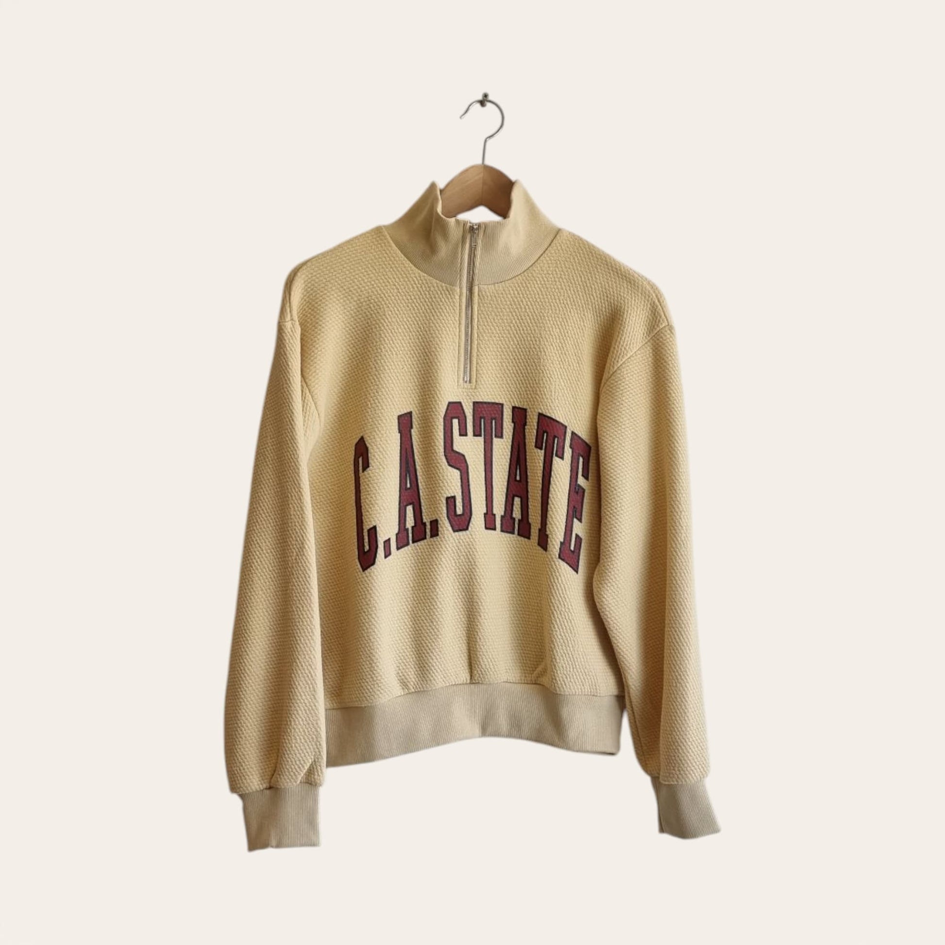 Beige zip-up cotton sweatshirt with C.A. STATE print – on hanger