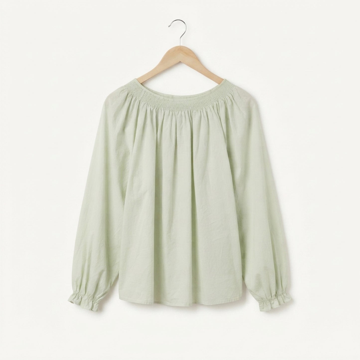 Light green cotton gathered blouse back view