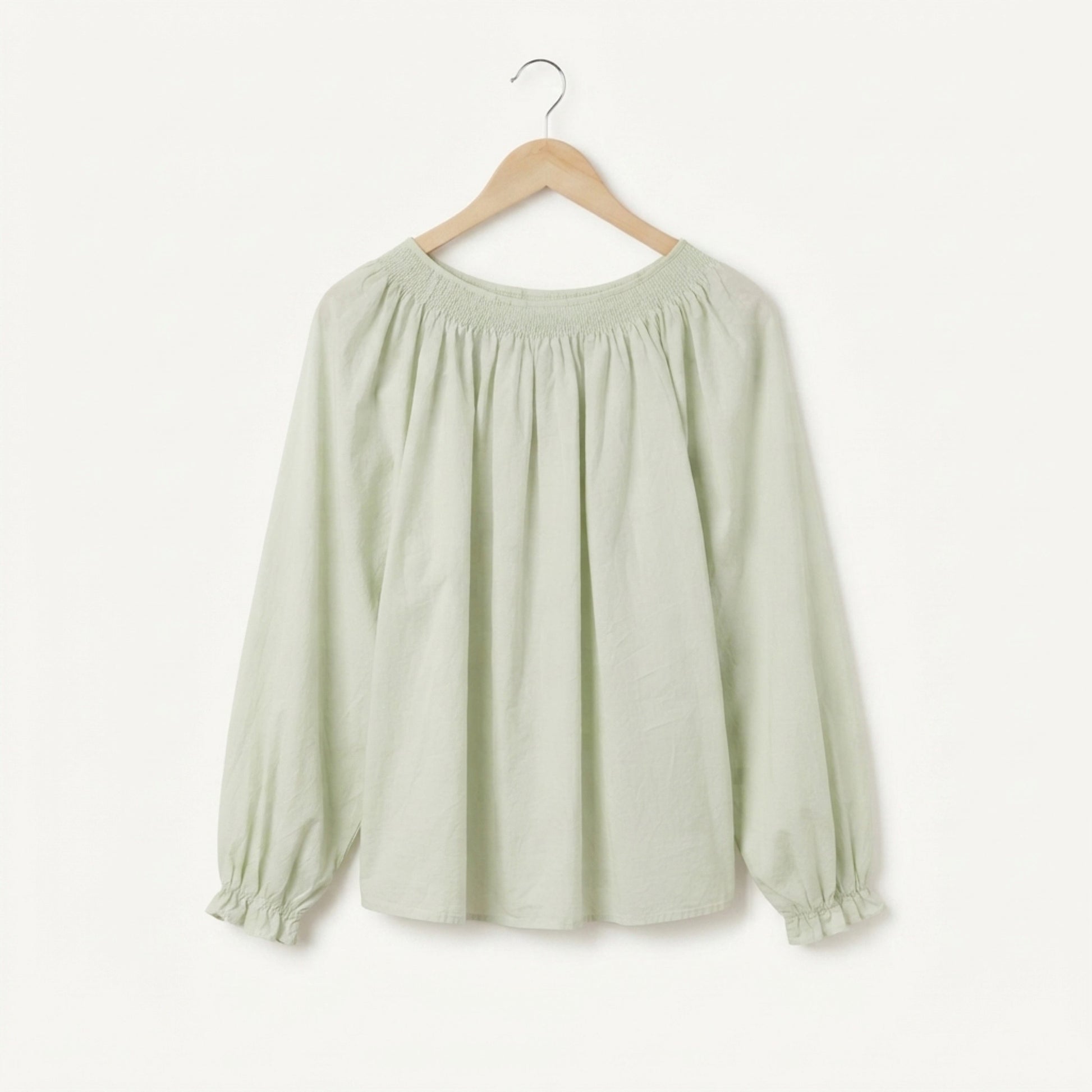 Light green cotton gathered blouse back view