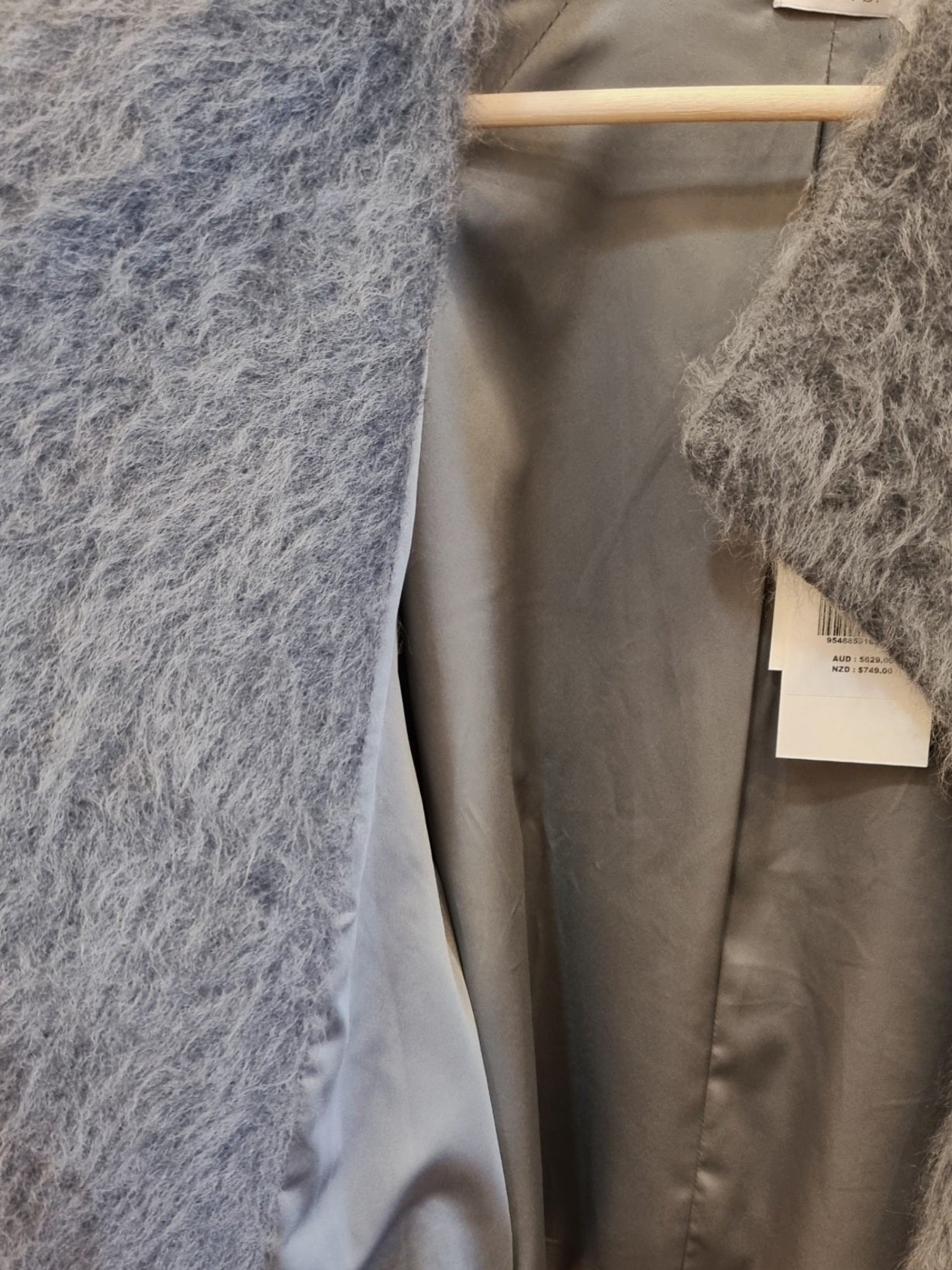 Minimalist women’s wool blend jacket detail