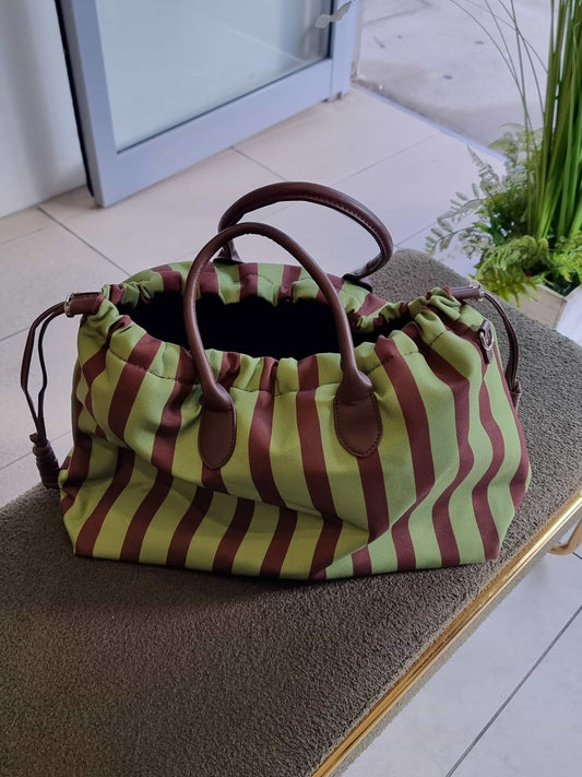 "Green striped fabric tote bag placed on a table – Nova Lux"
