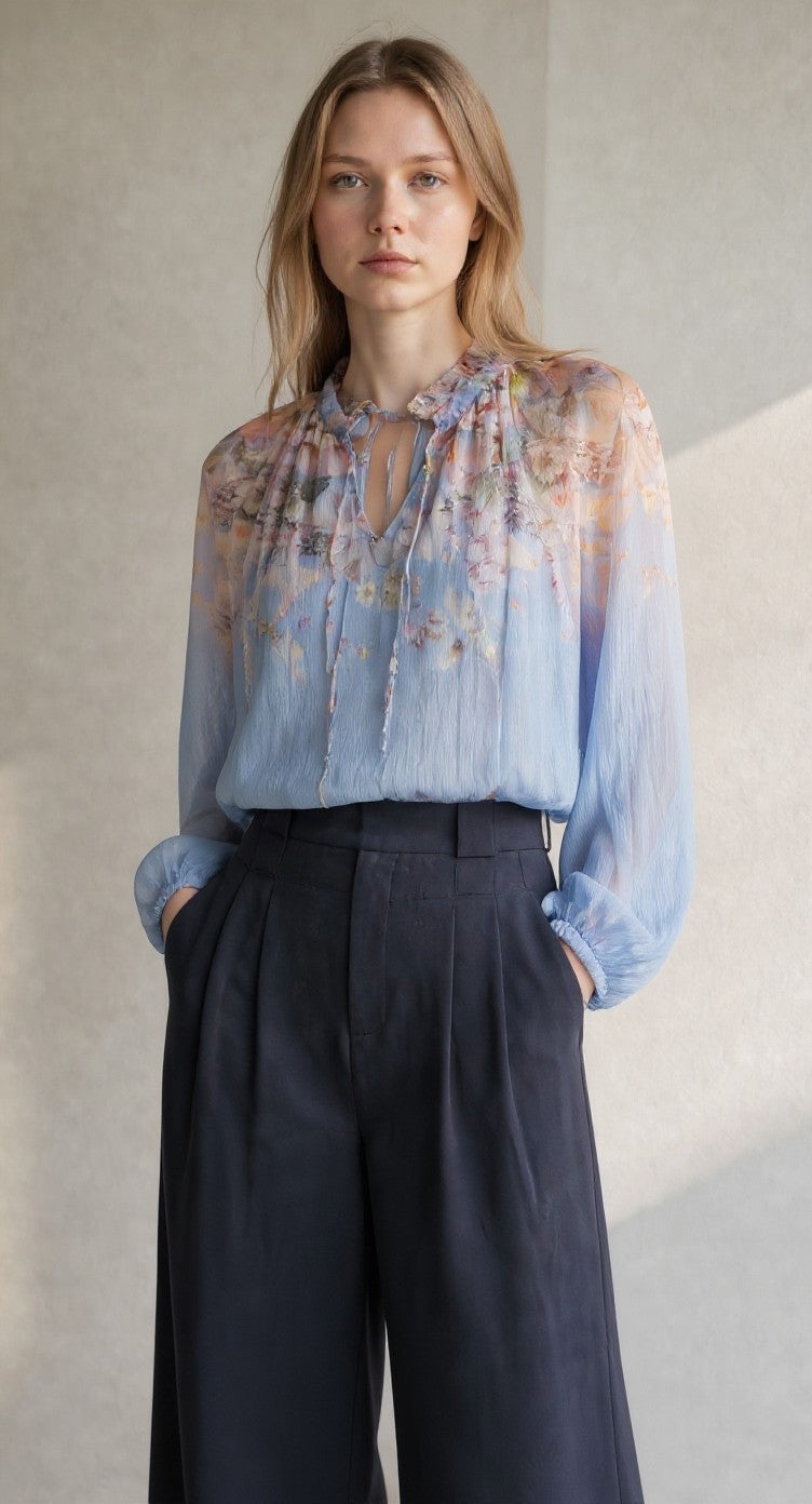 Blue floral print detail on the Luna Printed 100% Silk Blouse.