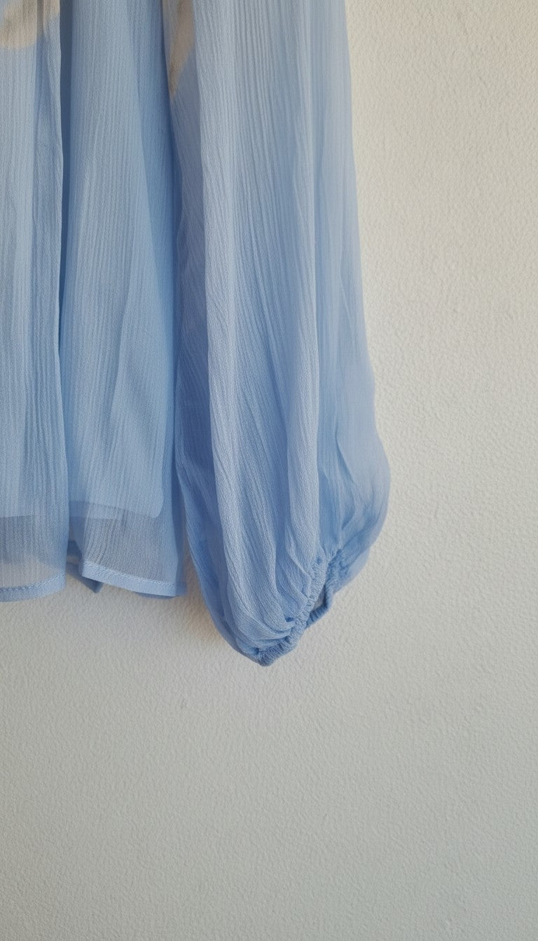 Elastic cuff detail on the Luna Printed 100% Silk Blouse.